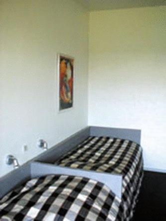 Doppel- oder Zweibettzimmer